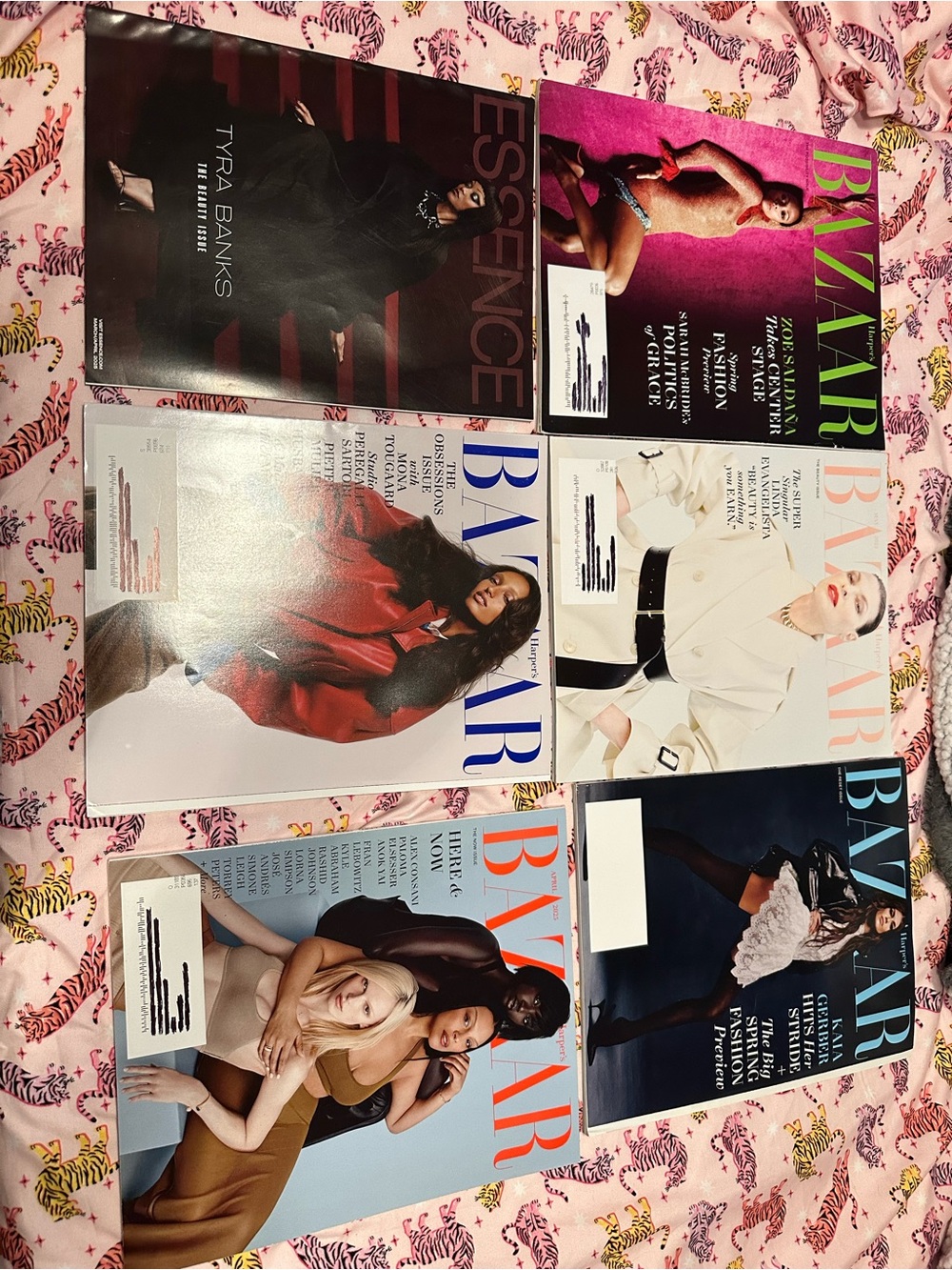 Bazaar and Essence Magazines. Tyra Banks, Zoe Saldana
